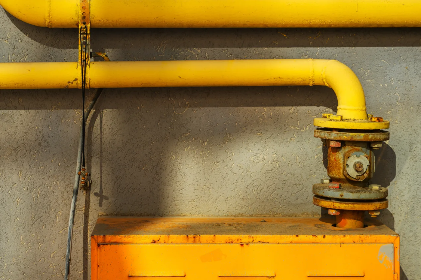 Gas line shutoff valve on an exterior wall
